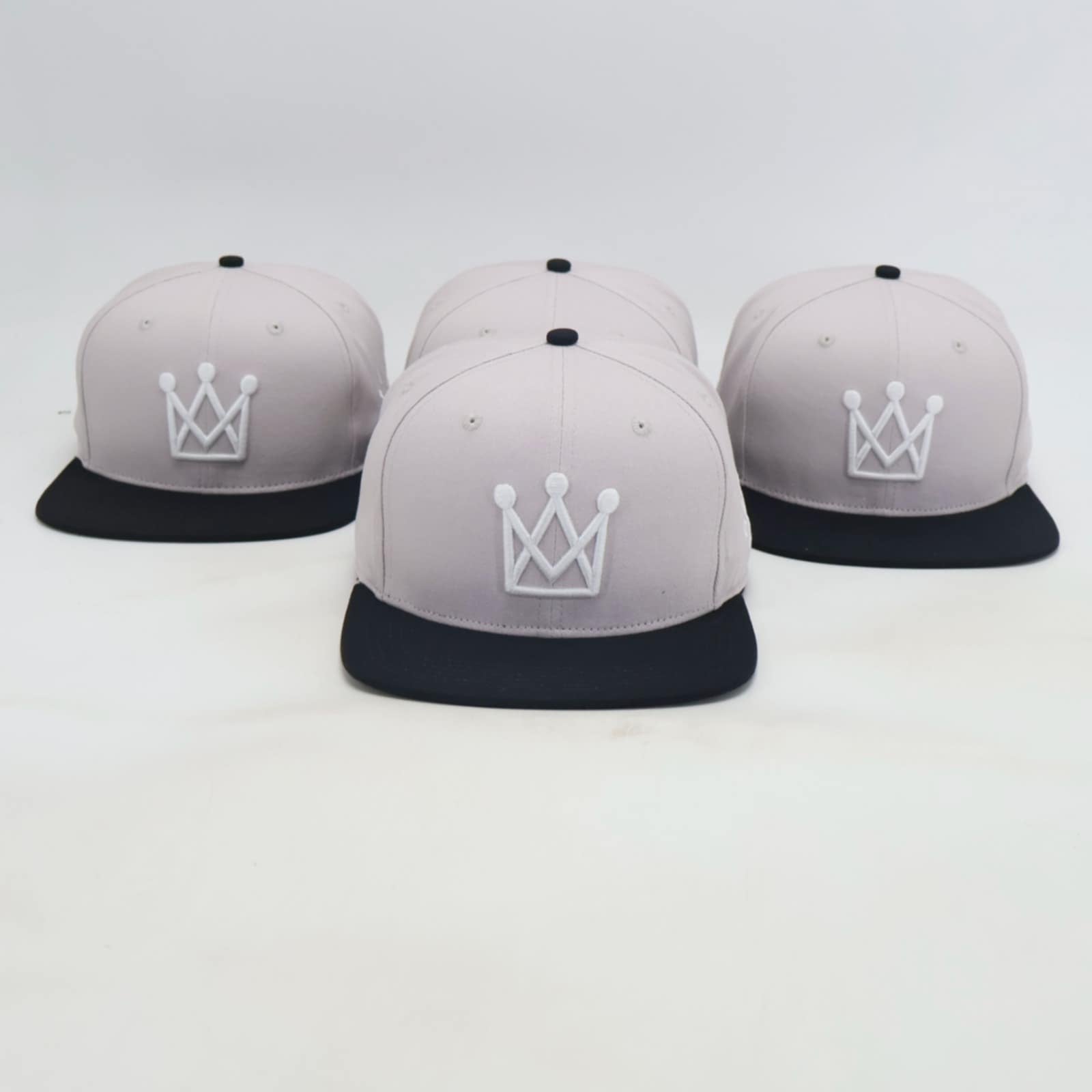 Grey and Black Snapback hat with white crown - front view