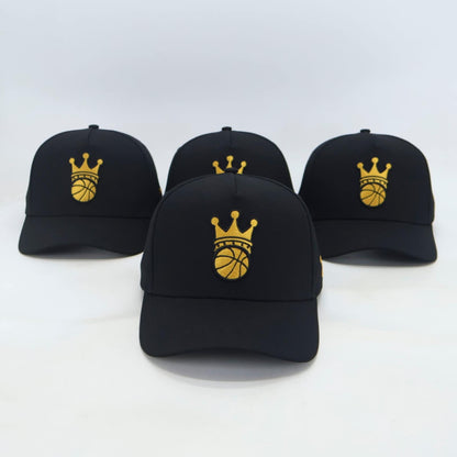 Black Snapback hat with gold ball/crown logo - front view